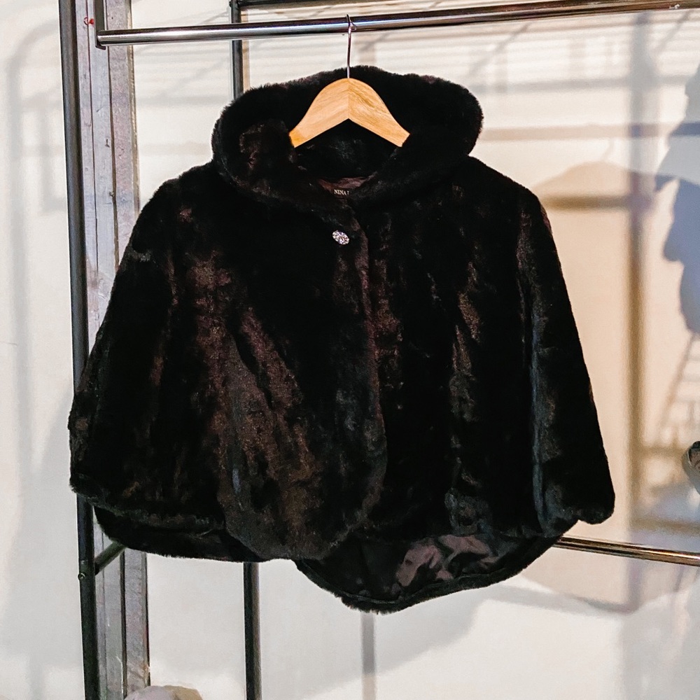 NWT black faux fur cape with embellished closure